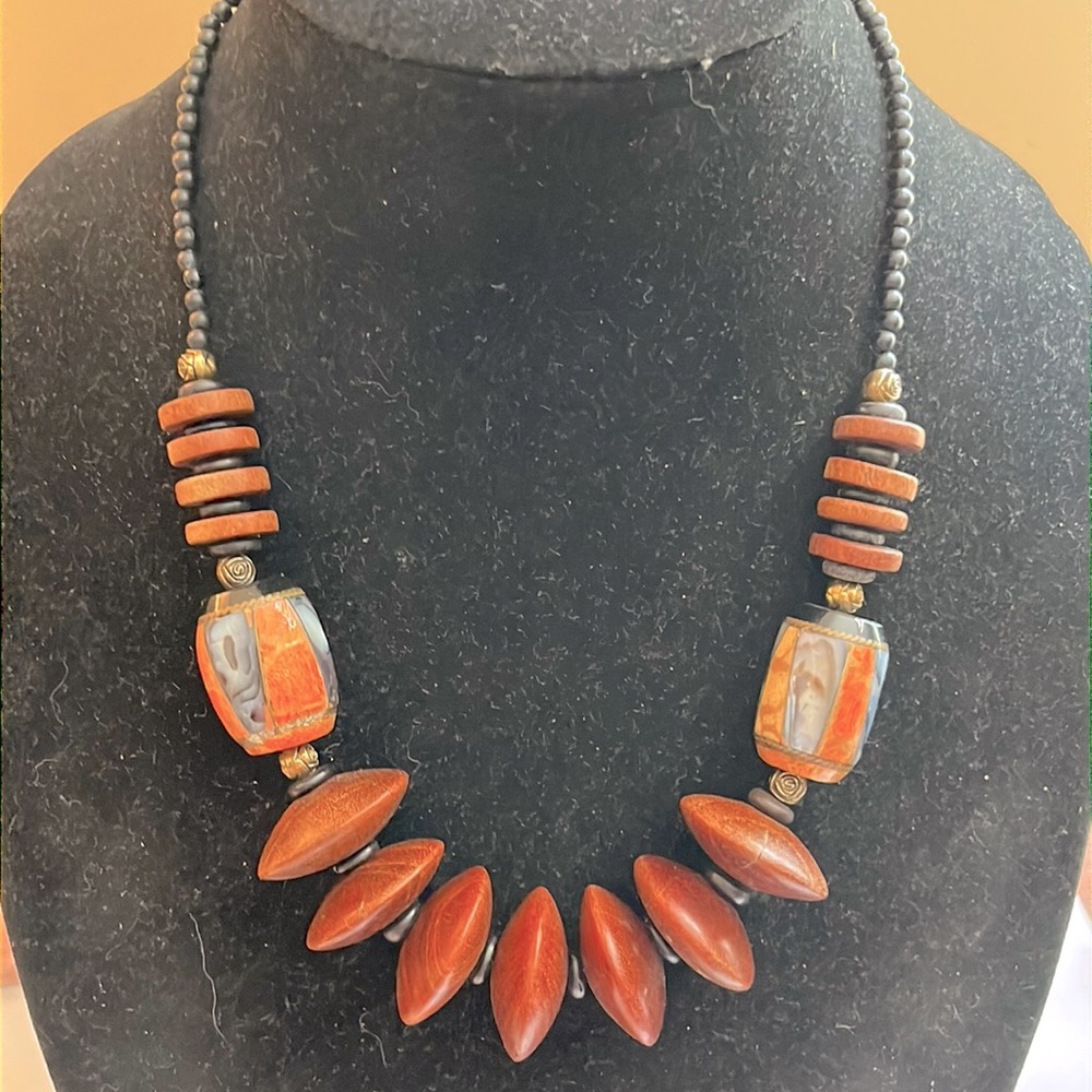 Wood and inlay shell and stone necklace. Clasp signed Hobe.